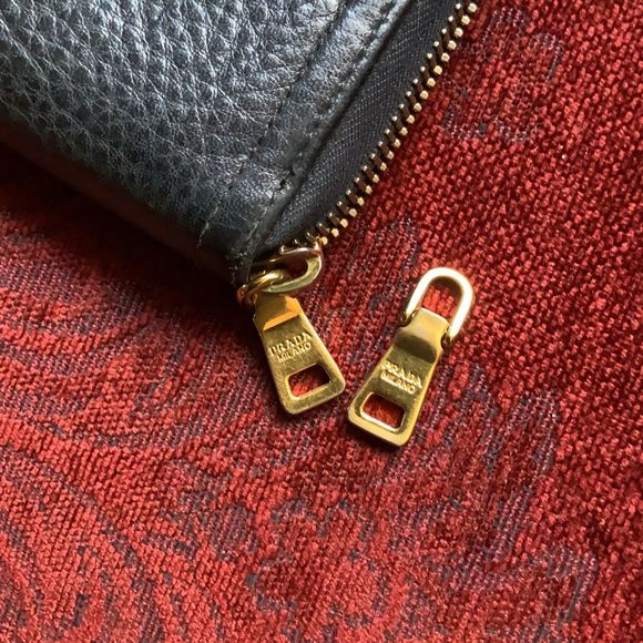 Prada large zip wallet black pebbled leather good condition. - Picture 8 of 8